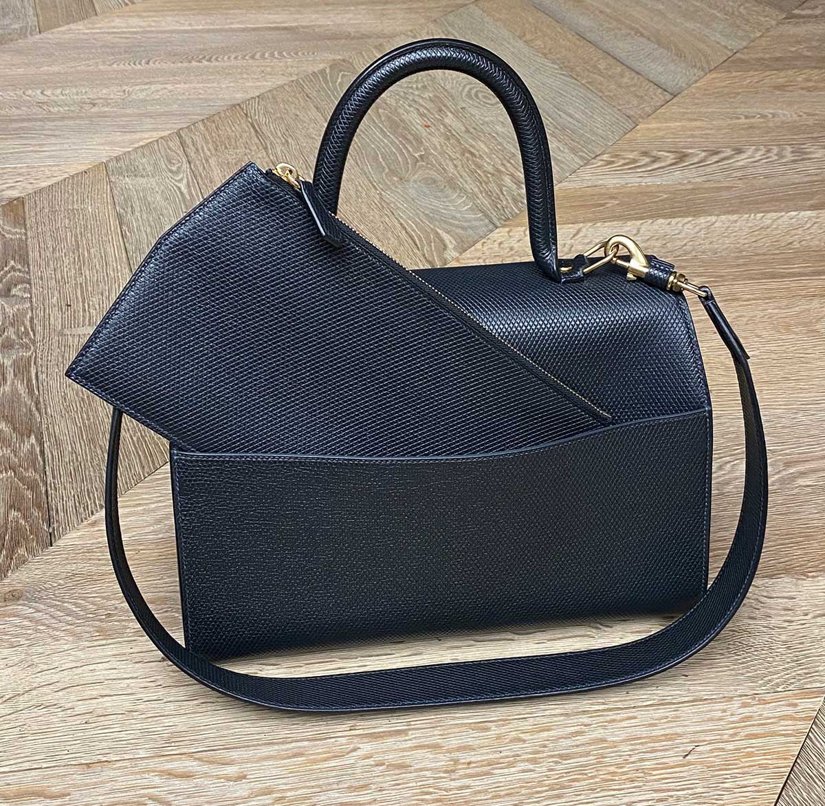 the zip pouch that fits into the back of the lorin flap bag